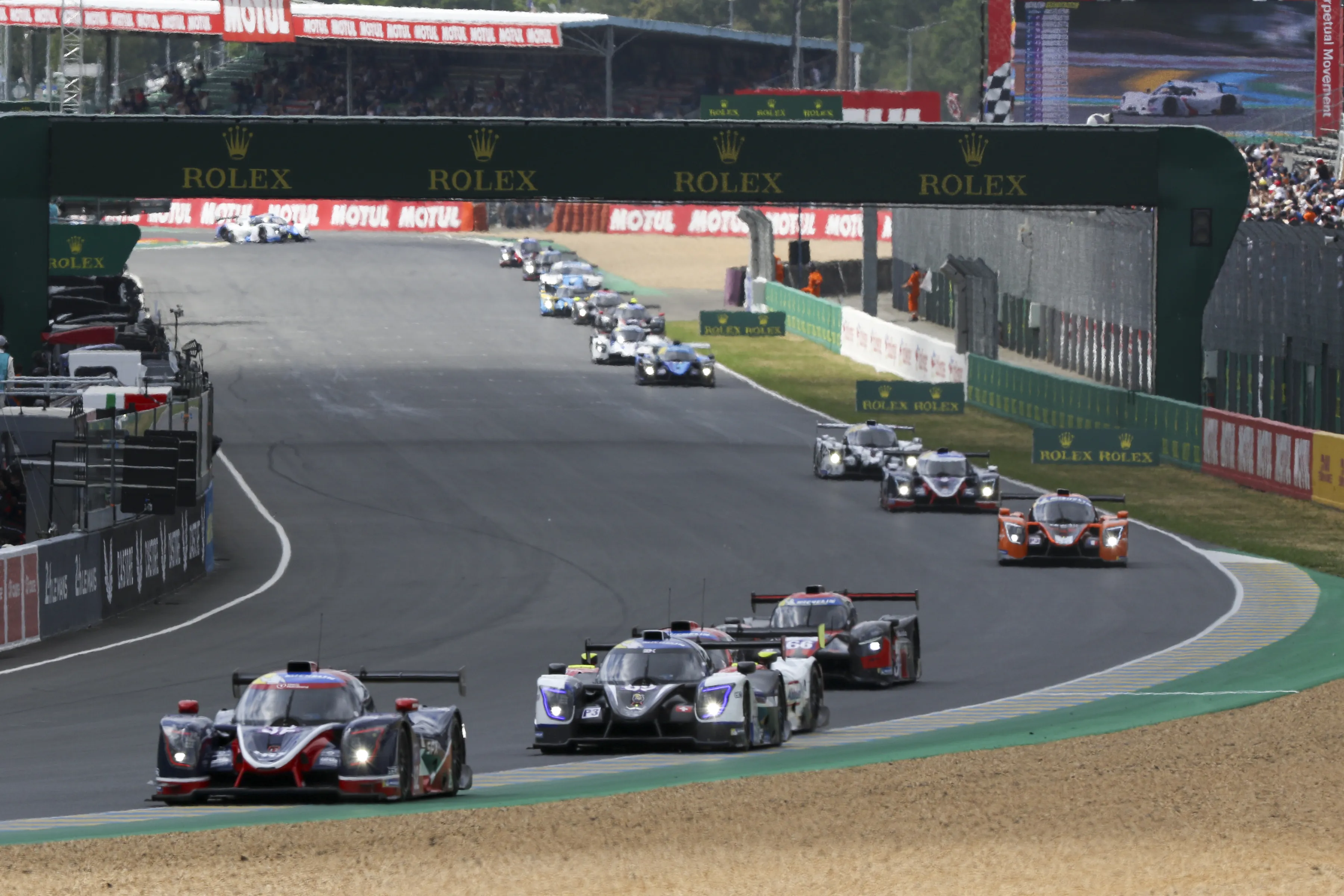 Race cars on track at Le Mans